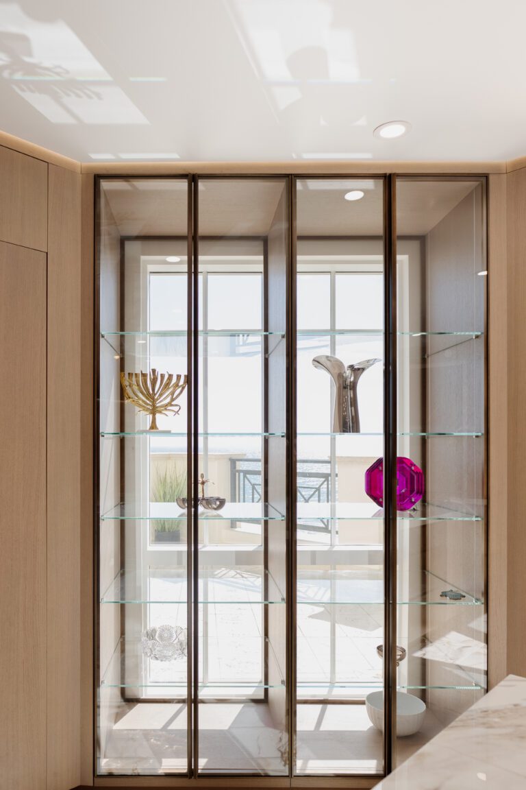 These display glass cabinets with no back are designed to ensure your beautiful ocean view remains unobstructed.