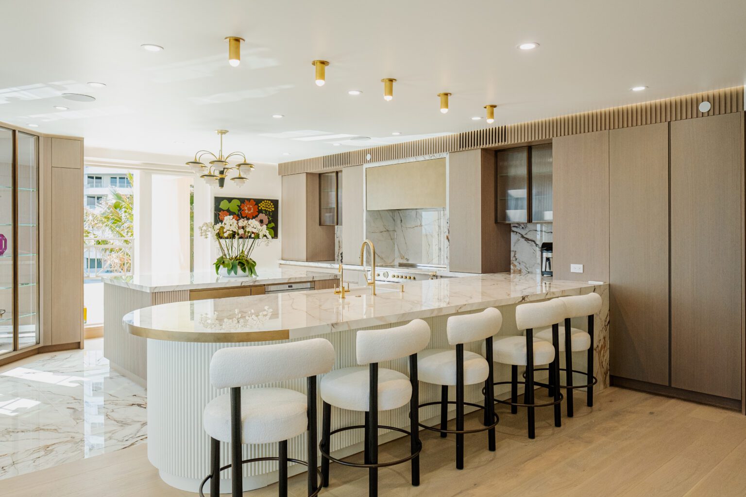 Metal Detail in the Island: Matches the hood and cabinets to give a cohesive look—seamless transition between the Metal Lacquer trim and the porcelain (high-end look)